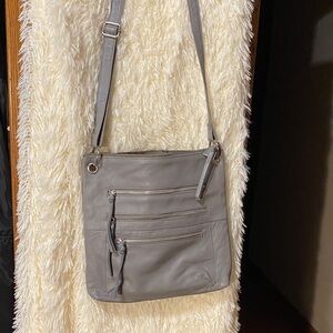 Great American Leather Works Woman’s Gray Crossbody Bag.